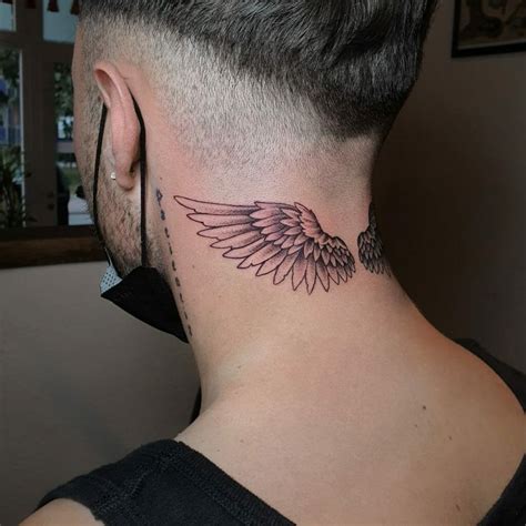 angel wings on neck tattoo|angel wings back tattoo designs.